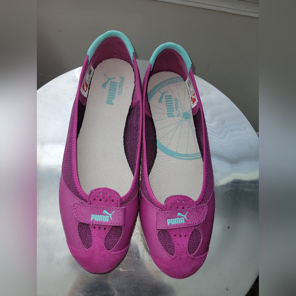 Puma Size 8.1/2 Woman's Purple Pink Sneakers. Used Excelent Condotion.